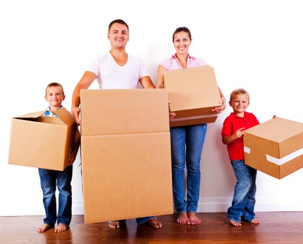 Removals team planning a home move on an Islington street