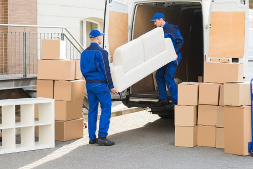 Removal team handling a house move in Islington near local residential streets