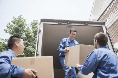 A local van service handling a flat move in North London