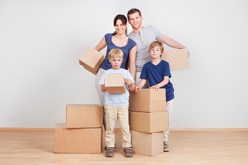 Careful loading of belongings from a London flat