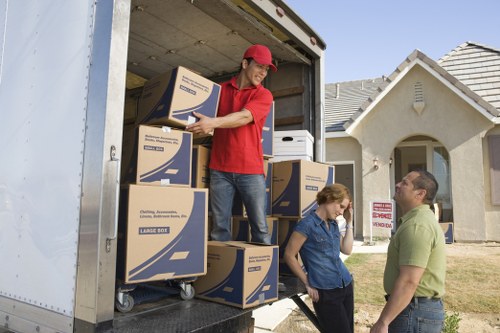 Careful loading of wardrobes and tables for furniture removals in Islington