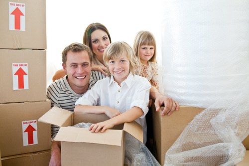 Unpacking boxes and organising items in a new Islington property