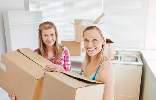 Fragile items and packing materials ready for a move in Islington