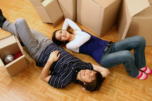 Local removals van positioned for a house move in Islington with limited parking