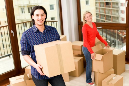 Local removals team preparing boxes and furniture for transport